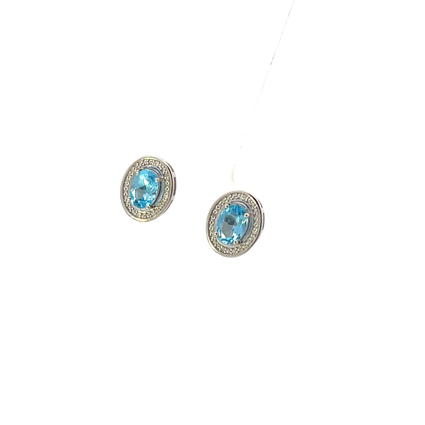 NATURAL DIAMOND AND BLUE TOPAZ OVAL STUDS WITH HALO