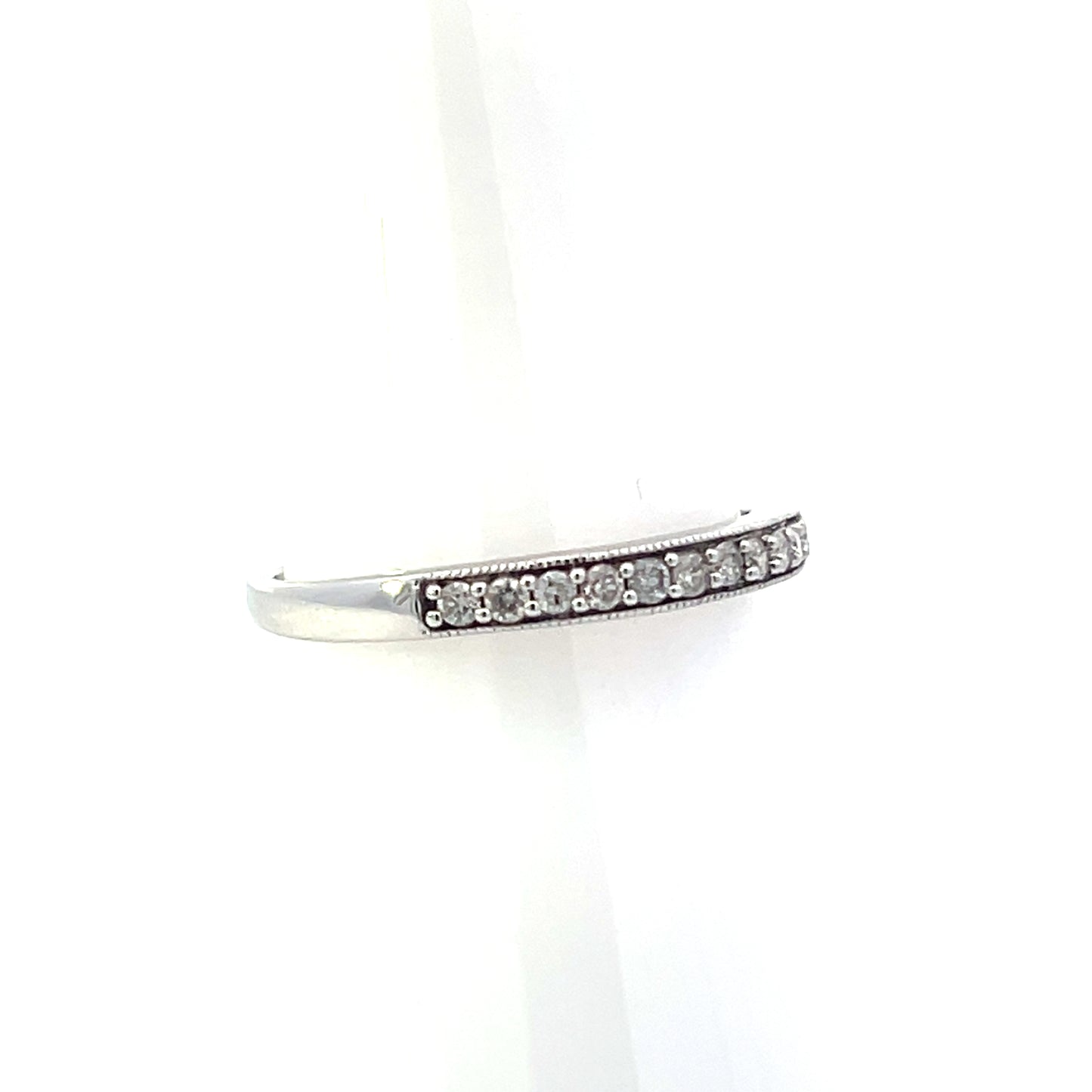 10K WHITE GOLD DIAMOND BAND WITH BEZEL 0.15CTW