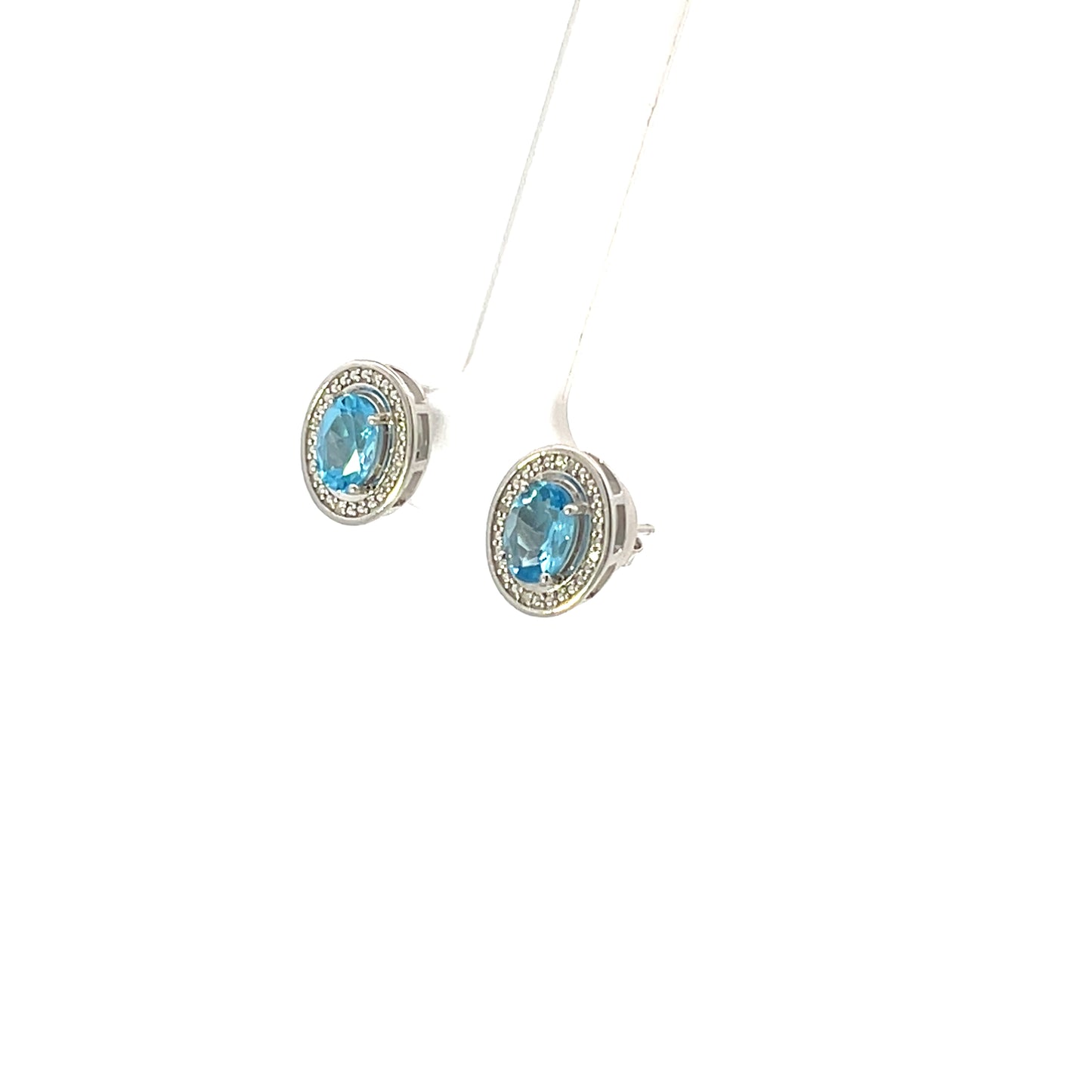 NATURAL DIAMOND AND BLUE TOPAZ OVAL STUDS WITH HALO