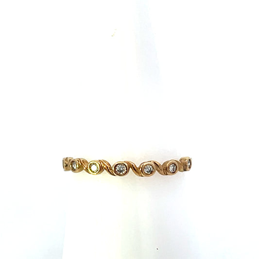10K TWISTED BAND WITH 7 DIAMONDS